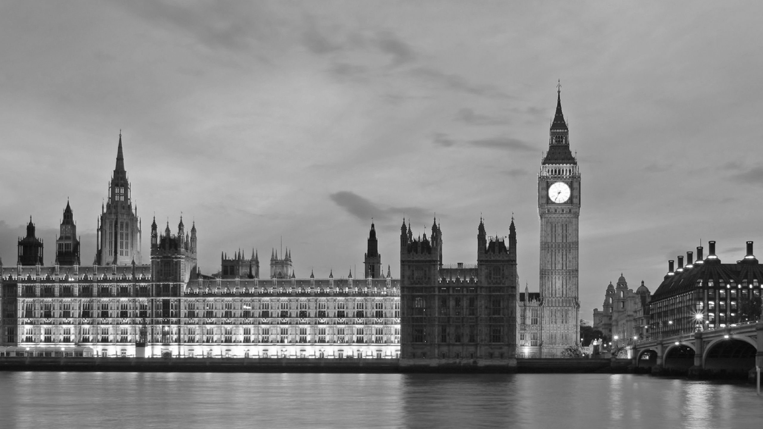 A black and white image of the Houses of Parliament